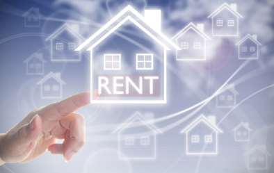 Hand pointing to house with 'RENT' text - Loss of Rent Insurance protection for landlords